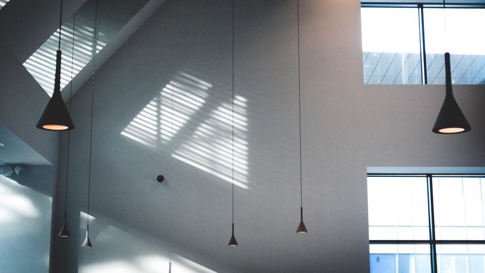 Black Pendant Lamps In White Building 1381782